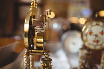 Fototapeta na wymiar Close-up of golden watch on table