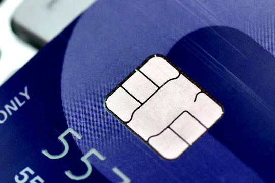 A closeup of credit card chip / Measure to deal with counterfeit card fraud / Credit card security and data encryption
