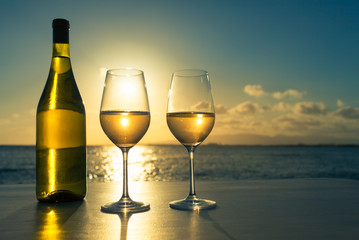 Pair of wine glasses on a cruse ship. Romantic dinning concept.  
