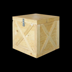 Wooden box isolated on black background