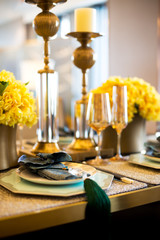 elegant crockery on dining table in modern dining room