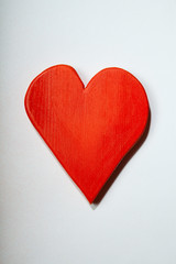 Holidays gift and heart on a white background.