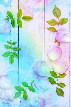 Beautiful artistic background with romantic roses petals and leaves
