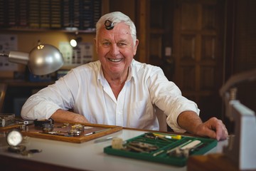 Portrait of smiling horologist