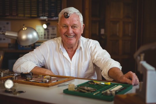 Portrait of smiling horologist