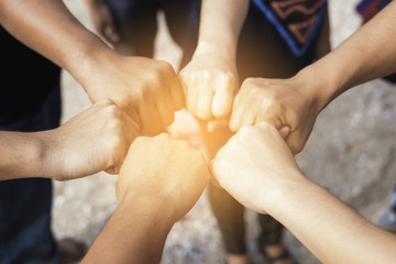 Teamwork concept,Business team standing hands together in the of