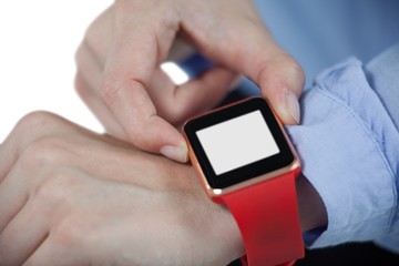 Businesswoman using smartwatch