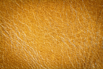Yellow leather texture, leather background for design with copy space for text or image. Pattern of leather that occurs natural.