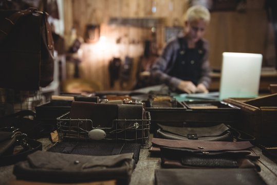 Various leather accessories on table