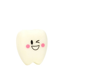 Children toy smile rubber teeth on white background.