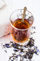 with a cup of herbal tea