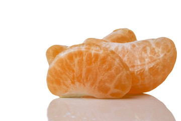 slices of peeled ripe tangerine orange