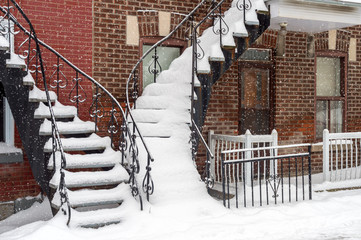 Staircases covered by snow In Montreal