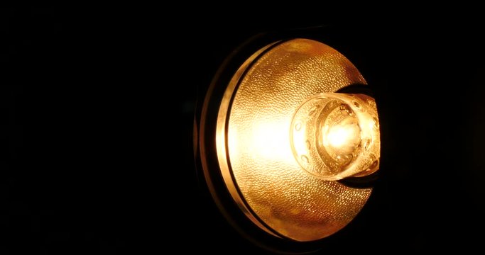 Gradualy brighting studio light.