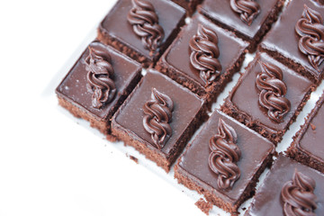 piece of chocolate cake, top view, selective focus, Chocolate cake with rich icing..