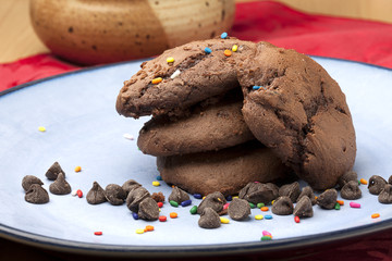 Chocolate chip cookies with sprinkles.