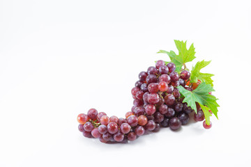 Fresh red grapes isolated on white background...