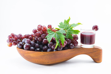 Fresh red grapes isolated on white background...