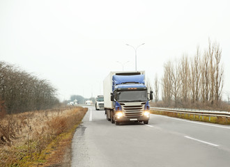 Fototapeta na wymiar Truck on road. Delivery and shipping concept.