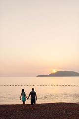 lovely couple relax in park together with sunlight