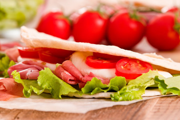 Piadina with ham and lettuce. 