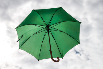 Umbrella and sky close-up.
