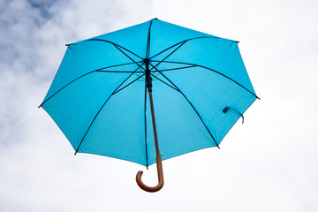 Umbrella and sky close-up.