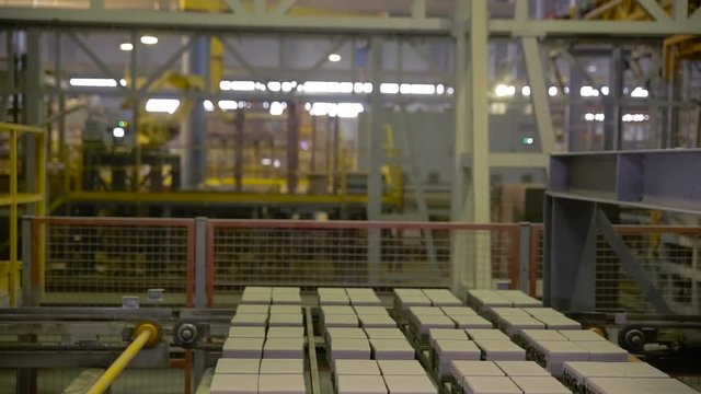 Modern factory equipment. Robots working at industrial factory. HD.