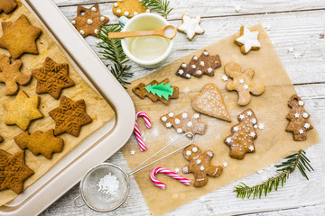 Homemade Christmas gingerbread cookies on wooden rustic background. 