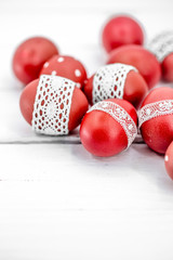Red Easter eggs on a white background