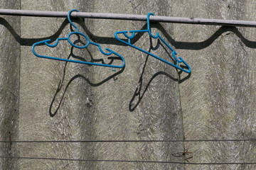 clothes hangers on the roof background