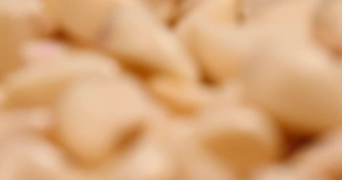 Close up of peeled garlic.