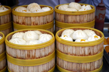 Chinese dumplings wooden steamer at Wangfujiang street in China