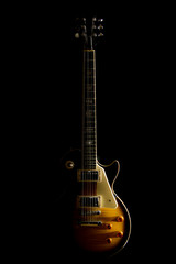 Electric guitar isolated on a black background