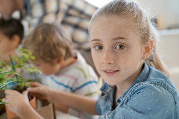 Portrait of school girl in biology class