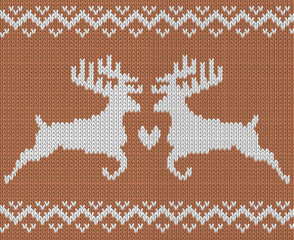 Knitting pattern with two deers and heart