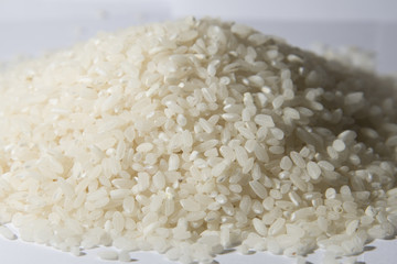 White rice scattered on the table.