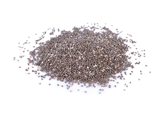 pile of dry chia seeds on white background