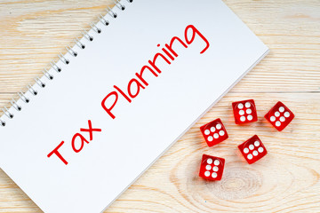 tax planning, concept with casino dices