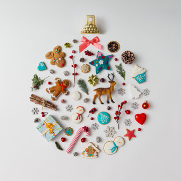 Christmas bauble made of decoration elements. Flat lay.