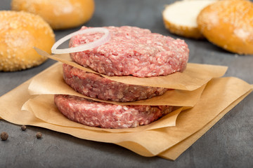 Chopped meat and the buns for hamburger