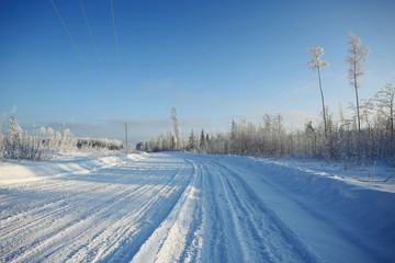 Obraz premium snowy road winter landscape