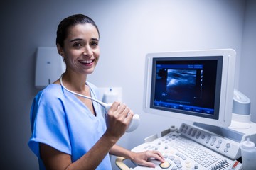 Nurse using ultrasonic device