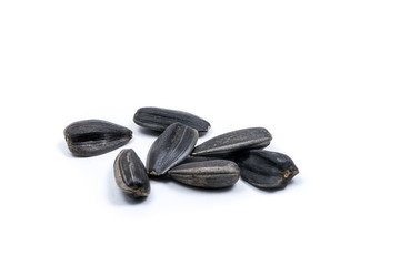 Closeup of a pile of sunflower seeds isolated on white background