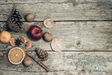 Winter composition on an old painted wooden background