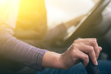 hands of a driver on gearbox