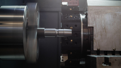 Rotated mechanism - automatic for machine processing of metal, industrial background, front view
