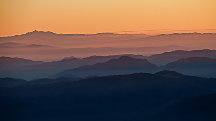 Hills at sunset background