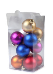 Christmas balls in box on white background
