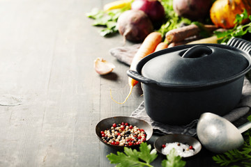 Cast iron pot and vegetables